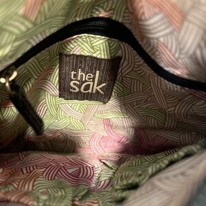 The Sak Black Crossbody Bag with Gold Accents